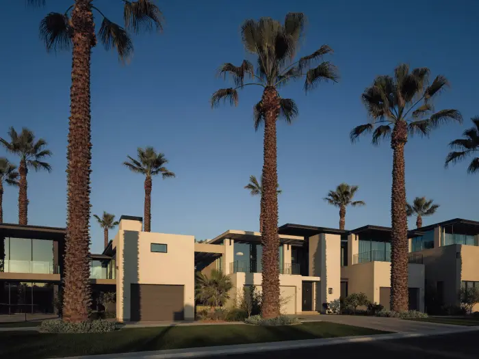 Modern residential development with palm trees
